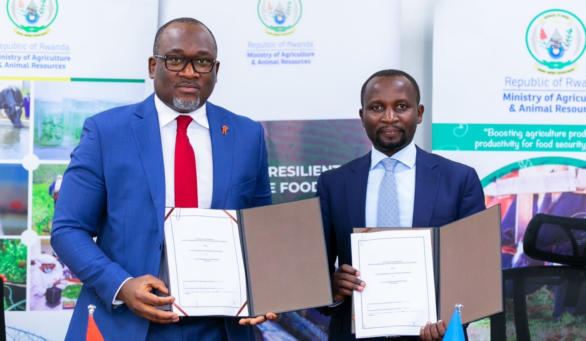 Rwanda’s Minister of Agriculture and Animal Resources, Ildephonse Musafiri (R), and his Guinean counterpart Felix Lamah, during signing the agriculture cooperation agreement on June 3, 2024, in Kigali. Courtesy