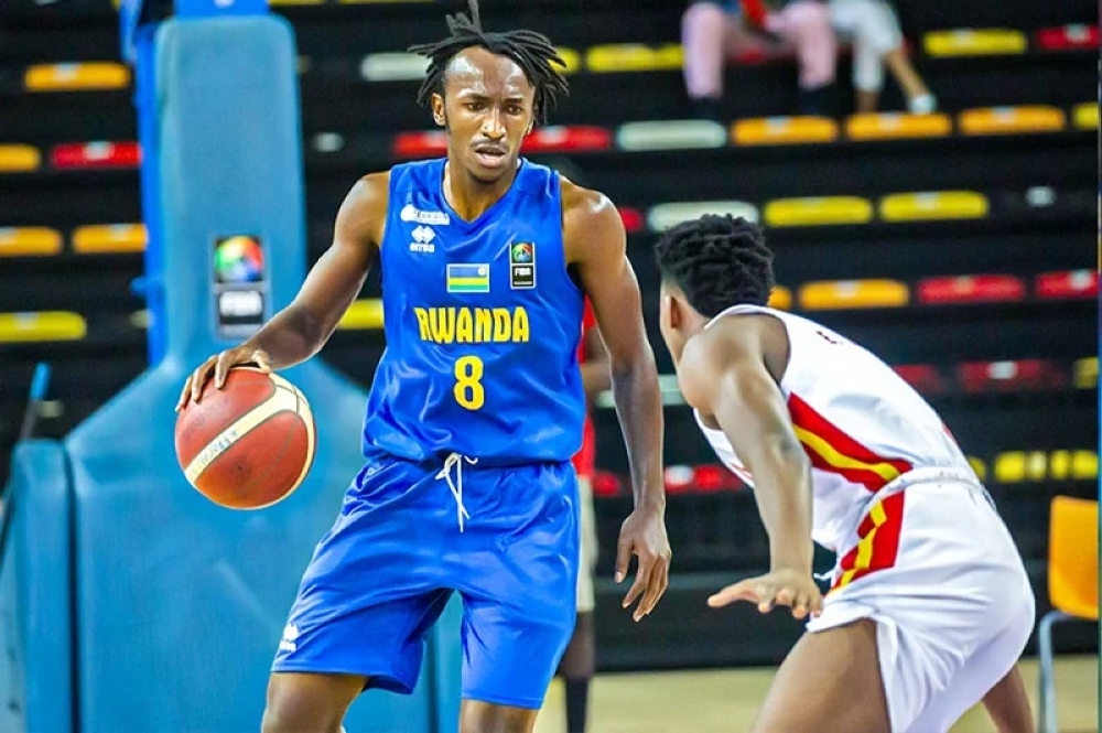 Star point guard Jean Jacques Wilson Nshobozwabyosenumukiza with the ball during a past game against Angola.