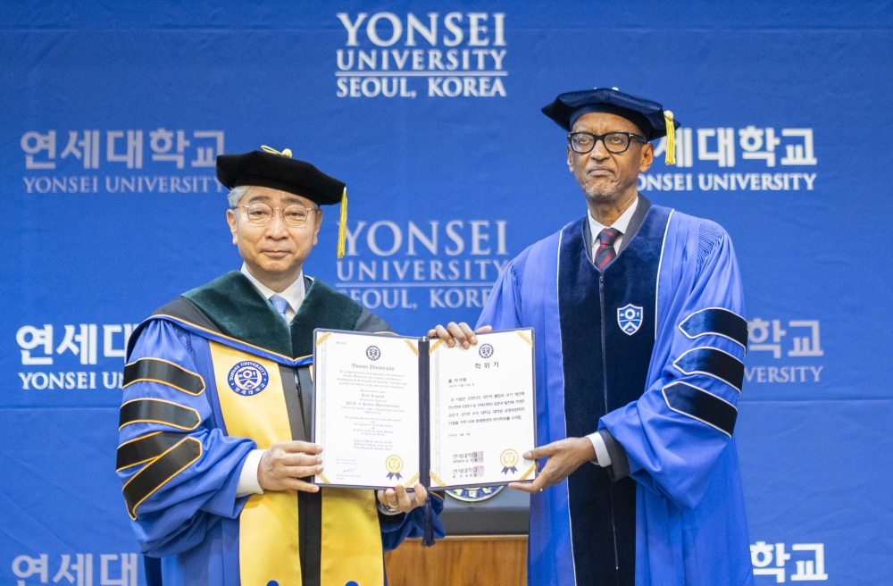 Professor Dong-Sup Yoon hands over the Honorary Doctorate to President Paul Kagame in South Korea, on Wednesday, June 5. Photo by Village Urugwiro