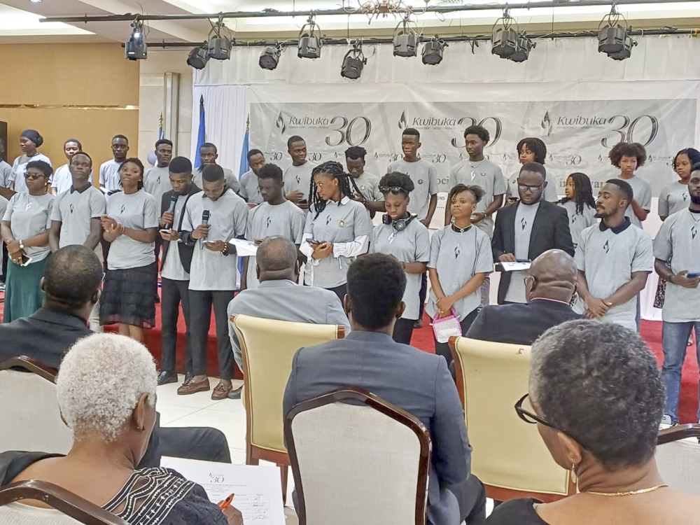 A group of Liberian and Rwandan youth reciting 30 facts about the 1994 Genocide against the Tutsi during the commemoration of the Genocide in Liberia