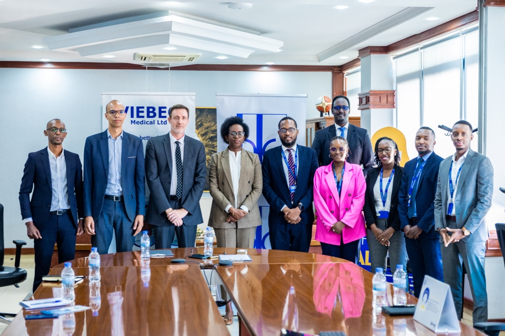 Bank of Kigali and VIEBEG Medical Ltd officials pose for a group photo after signing the partnership agreement on June 6. Photos by Craish Bahizi
