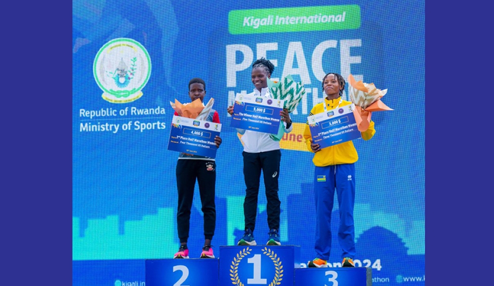 Emeline Imanizabayo (R) struck bronze medal  women’s half marathon. COURTESY