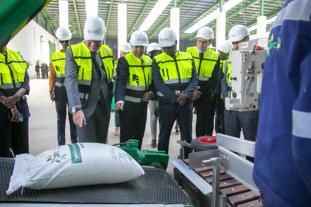 Minister of Trade and Industry Jean Chrysostome Ngabitsinze (2nd R) with officials at the launch of a fertilizer blending factory in Bugesera District  on December 20, 2023. Courtesy
