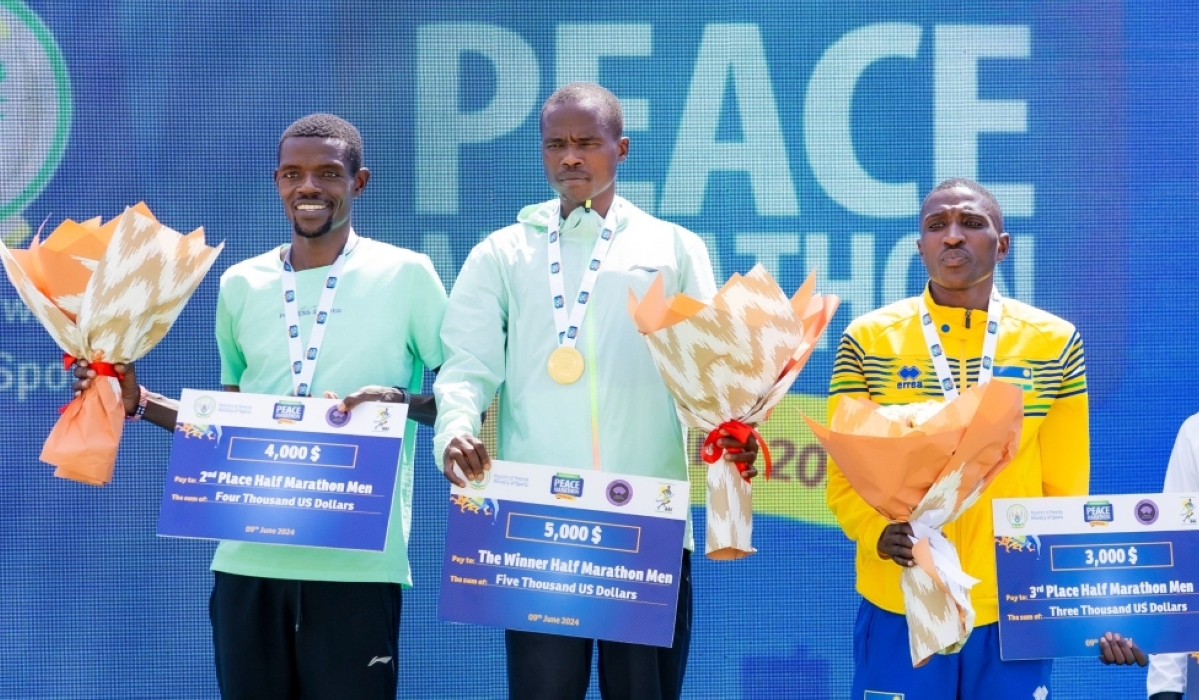 Rwanda’s Emmanuel Mutabazi (R) struck bronze medal in the men’s half marathon. The Police Athletics club runner believes Rwandans have what it takes to win big races of Kigali International Peace Marathon caliber-courtesy