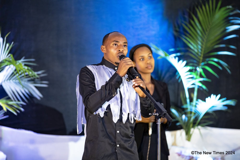 Renowned musician Joe Musinga sings during   an evening of special tributes to the Genocide victims through music and art at Kigali Genocide Memorial  on Sunday, June 9.