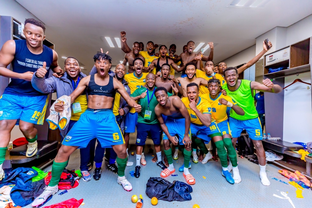 National football team players and staff celebrate in the dressing room following a 1-0 win over Lesotho at Moses Mabhida Stadium in Durban, South Africa, on Tuesday, June 11