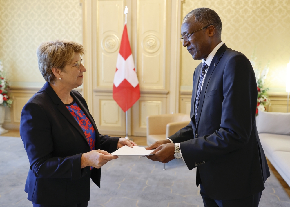 Rwanda’s Ambassador to Switzerland James Ngango  presents his letters of credence to President Viola Amherd on Tuesday, June 11. Courtesy