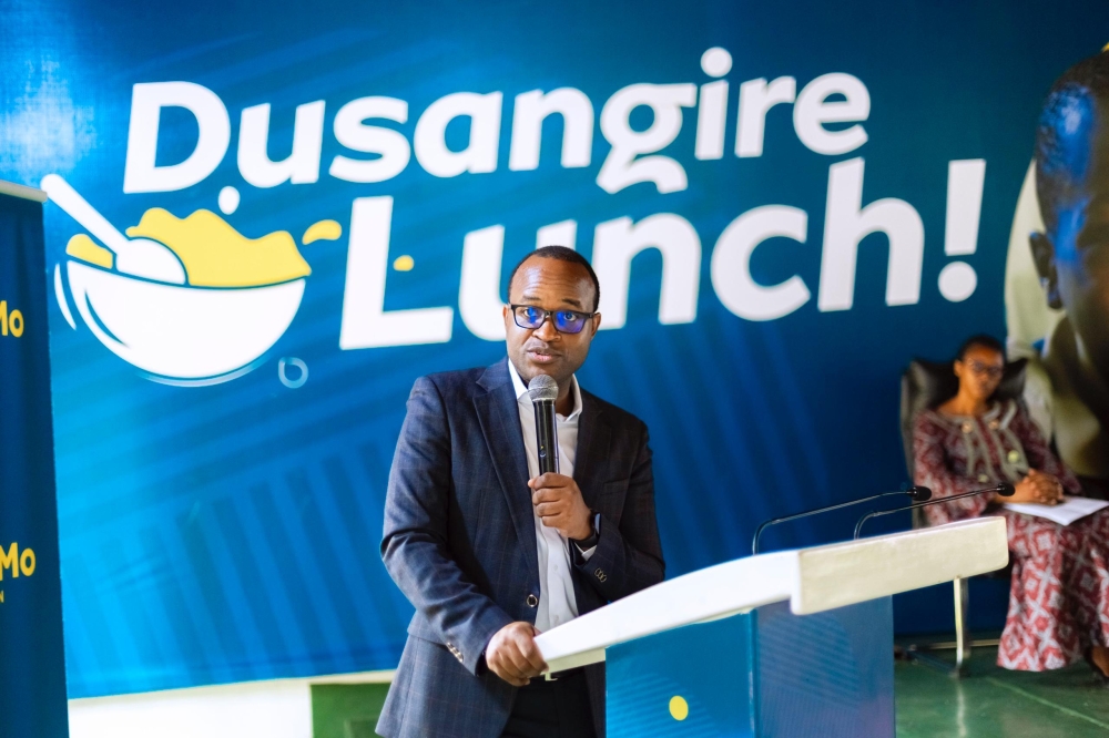Minister of Education Gaspard Twagirayezu delivers remarks during the launch of Dusangire Lunch Campaign  at Groupe Scolaire Kacyiru II on June 12. Courtesy