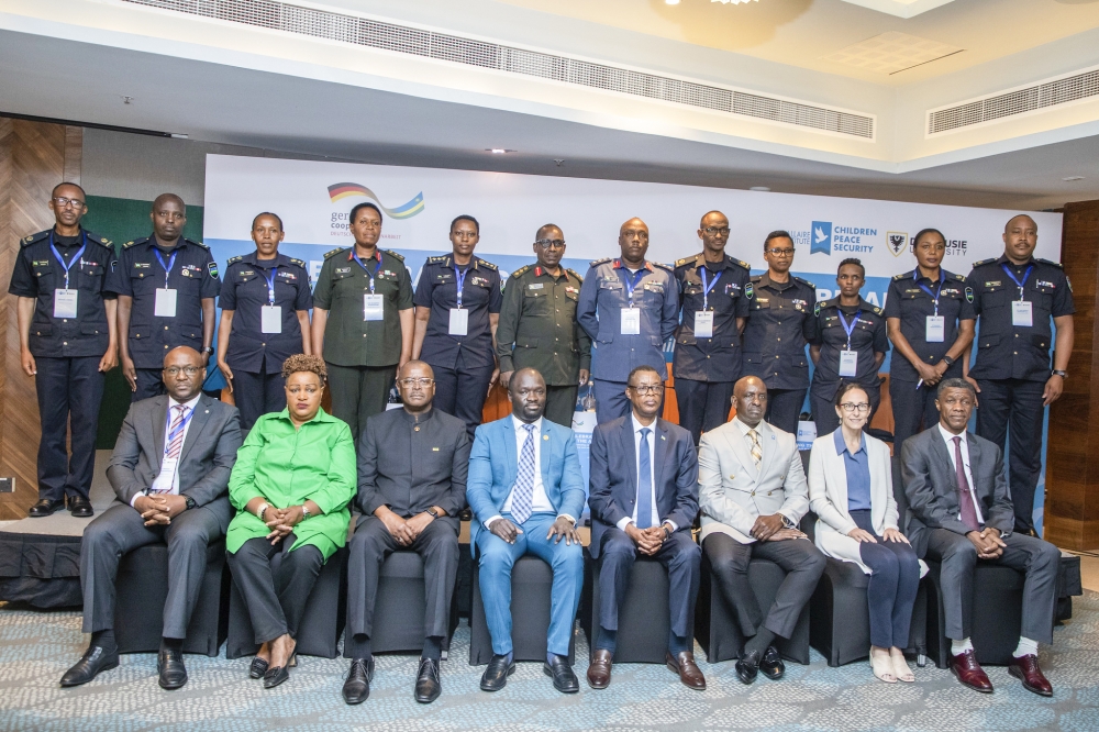 Officials pose for a group photo at the opening session of the meeting in Kigali on Thursday June 13.