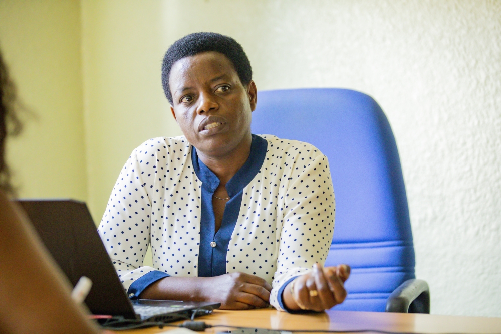 Celine Uwimana, one of the only two women who graduated from University of Rwanda in a class of hundred men in 2000, during interview. Emmanuel Dushimimana