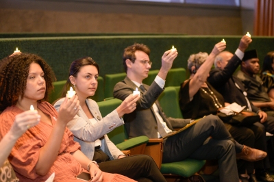 Mourners hold lit candles in honour of victims of the Genocide against the Tutsi, in Brazil. The commemorative event, held in the Legislative Assembly of the Federal District, was attended by Genocide survivors, Brazilian officials, and members of the diplomatic corps, among others. Courtesy