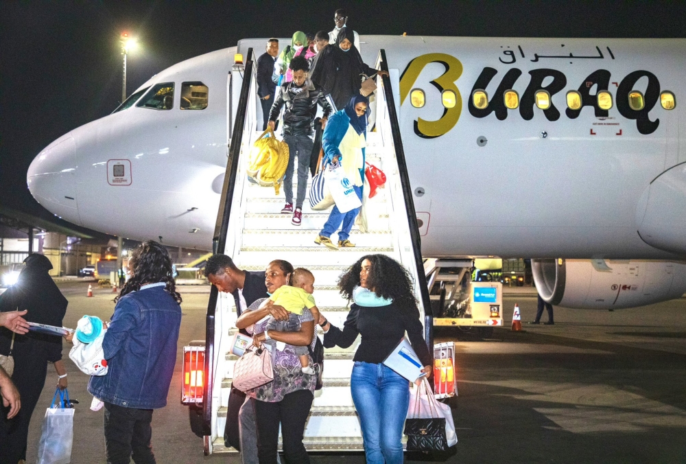 The rescued African refugees on arrival at the Kigali International Airport. Courtesy.