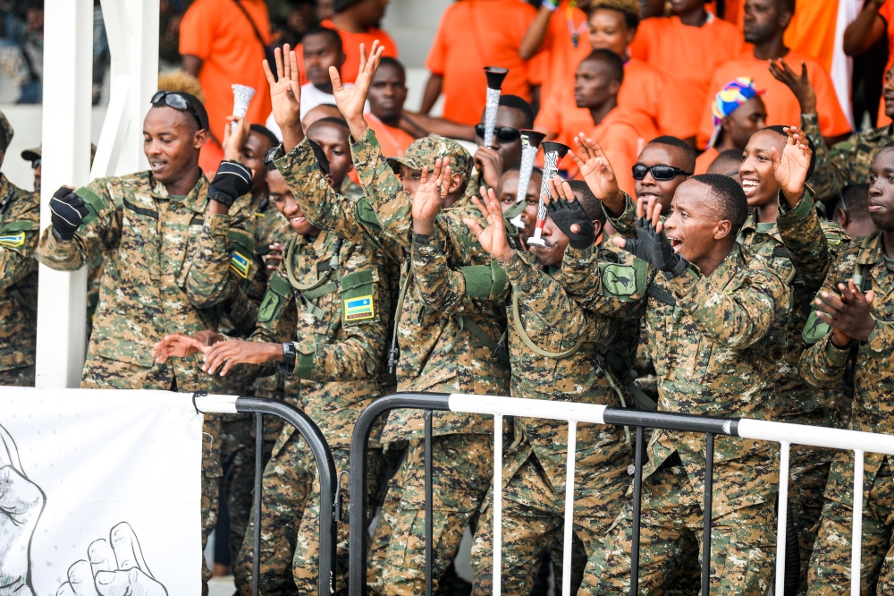 The Republican Guard team supporters celebrate the victory for winning their third straight RDF Liberation Cup tournament after defeating BMTC Nasho 3-0 in the 2024 final match at Kigali Pele stadium on Sunday, June 16. Photo by Craish Bahizi