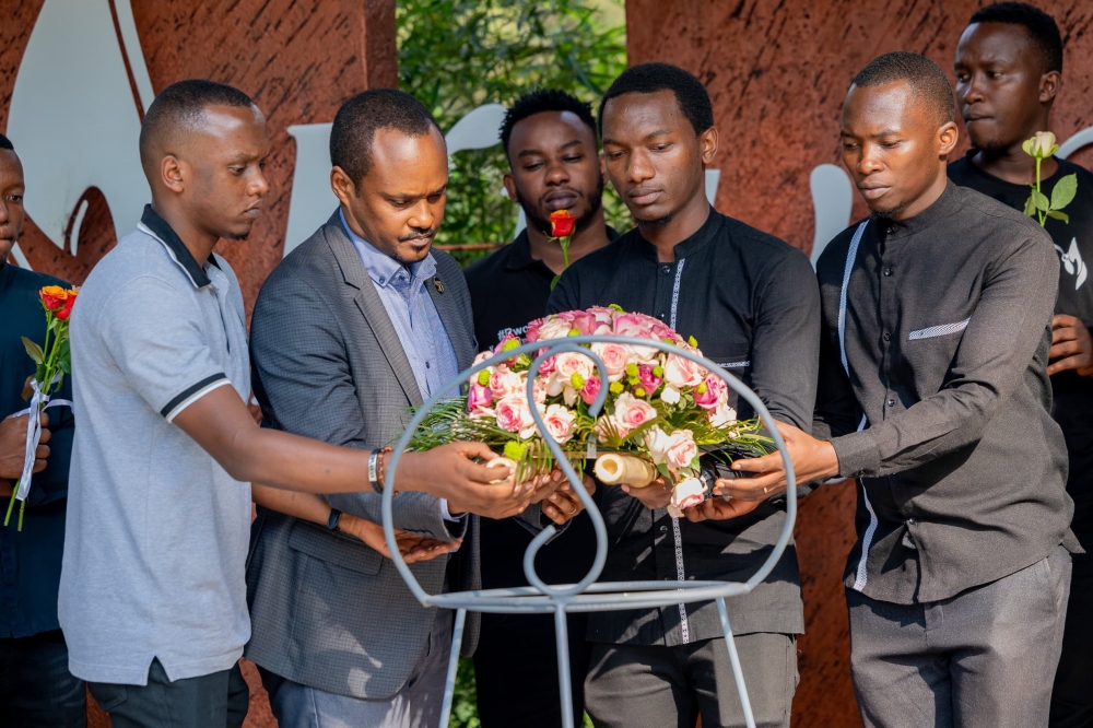 Social media influencers lay wreaths in honour of victims of the Genocide during a visit to the Kigali Genocide Memorial on Sunday, June 16. Courtesy