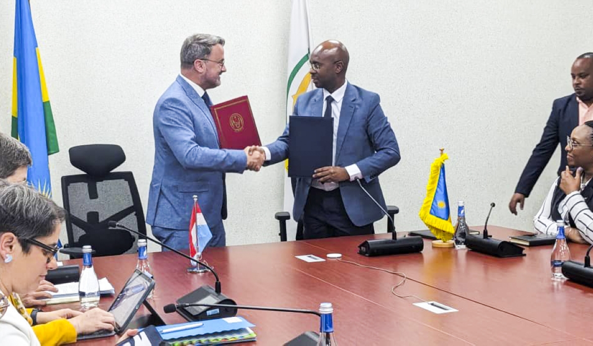 Minister for Finance and Economic Planning, Yusuf Murangwa and  Luxembourg Deputy Prime Minister, Xavier Bettel during the signing of a €12 million grant on Tuesday June 18.  Michel