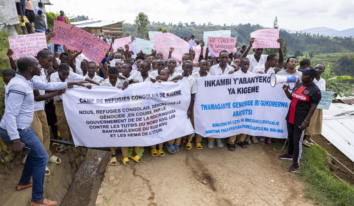 Congolese refugees during a peaceful march at Kigeme refugee camp to call for UN to stop genocide against Tutsi in eastern DR Congo on March 8, 2024. Photo by Olivier Mugwiza