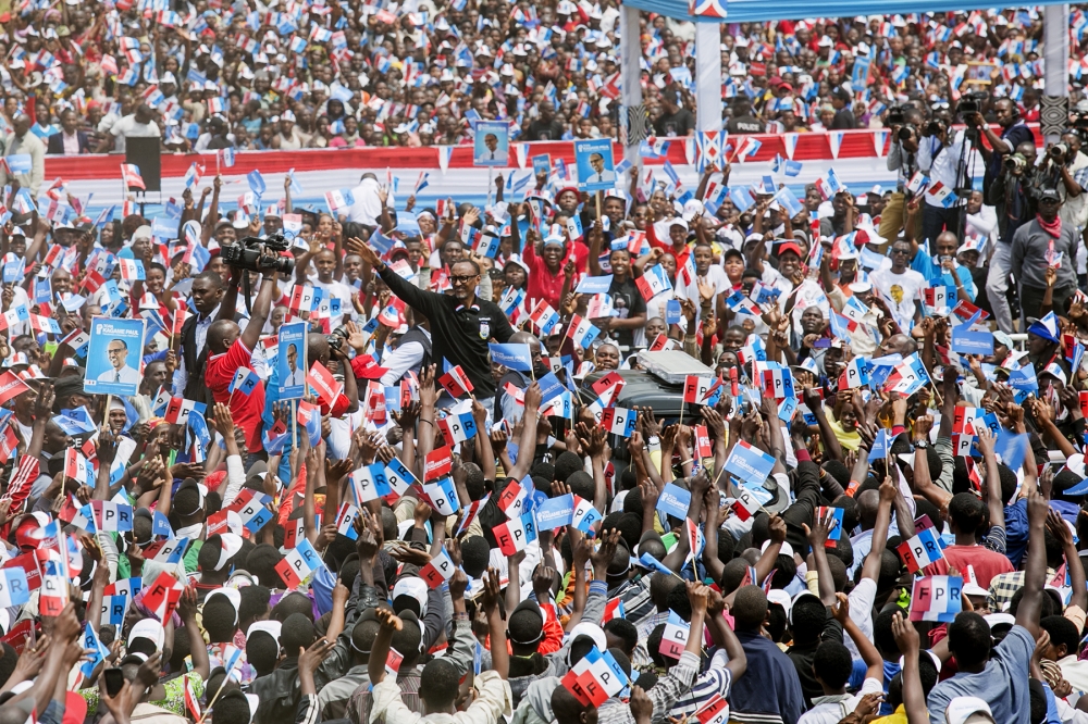 Kagame waves at a campaign rally in a previous election cycle.  File.