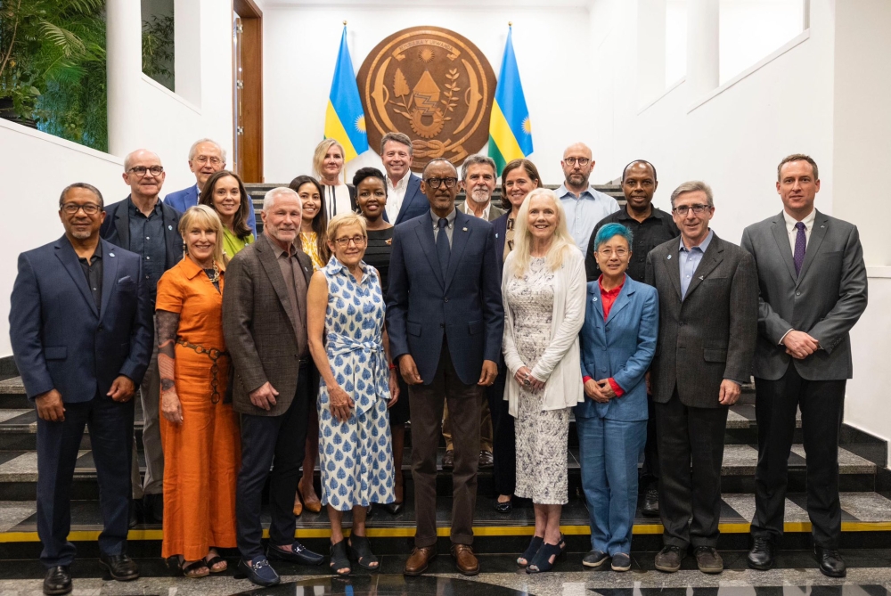 President Paul Kagame poses for a photo with the visiting delegation from the Miller Center for Social Entrepreneurship and Santa Clara University at Urugwiro Village on Friday, June 21.Village Urugwiro
