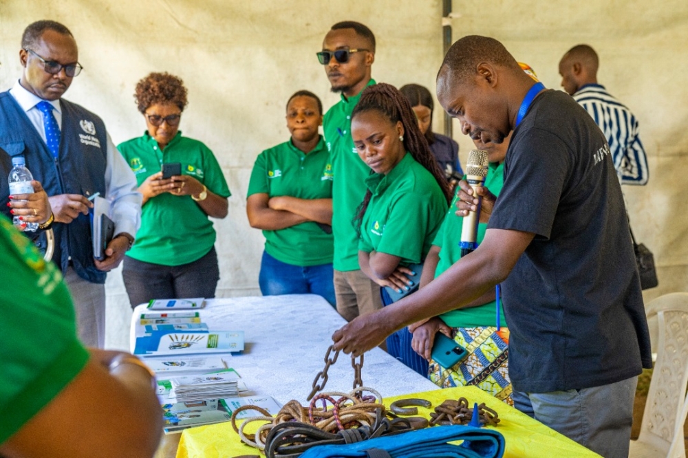 Participants at Mental health awareness compaign visit a mini exhibition to see some of tools that the society had been using while dealing with a mental health victim. Courtesy