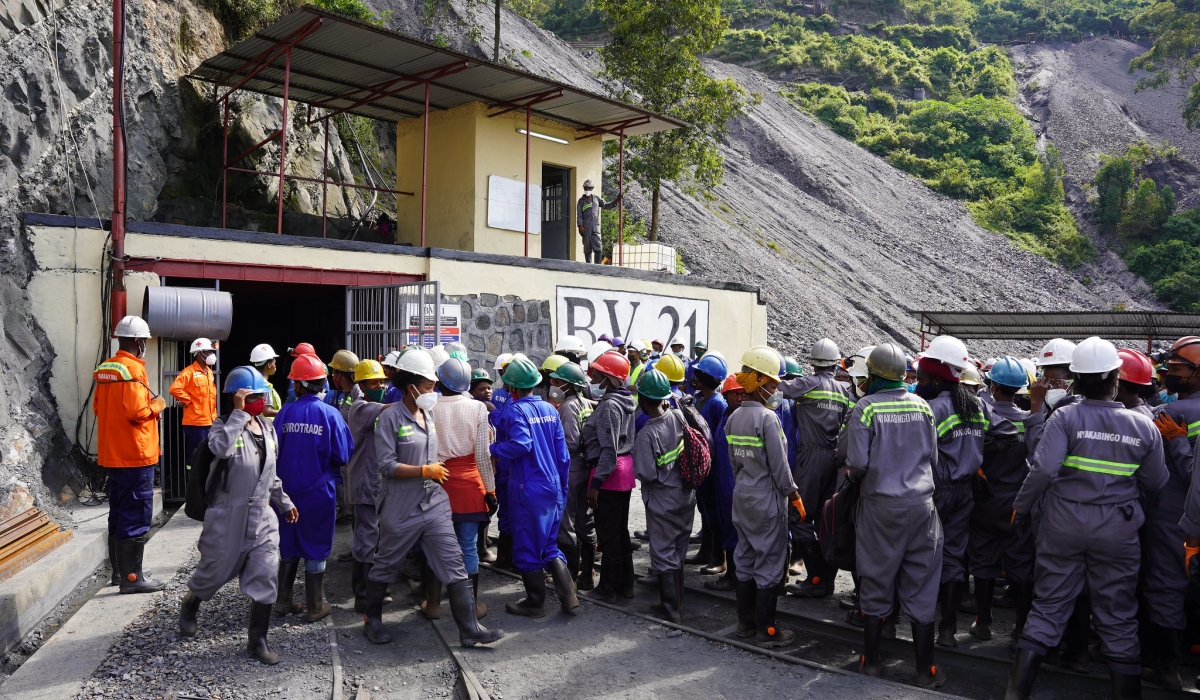 Miners during a briefing before entering a tunnel in Rulindo District.