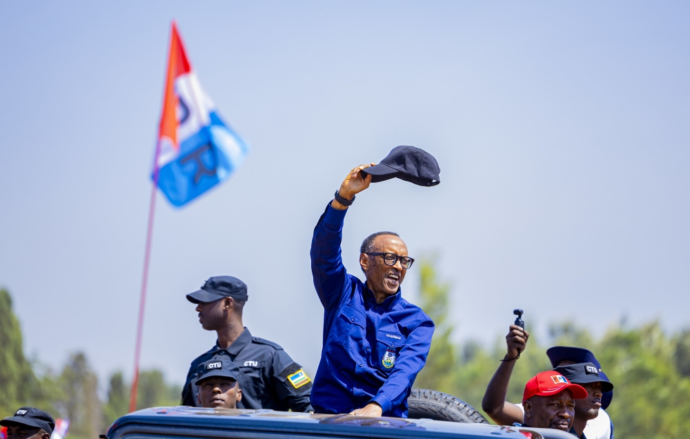 RPF Inkotanyi flag bearer Paul Kagame greets thousands of residents who turned up for the ongoing electoral campaign in Huye.