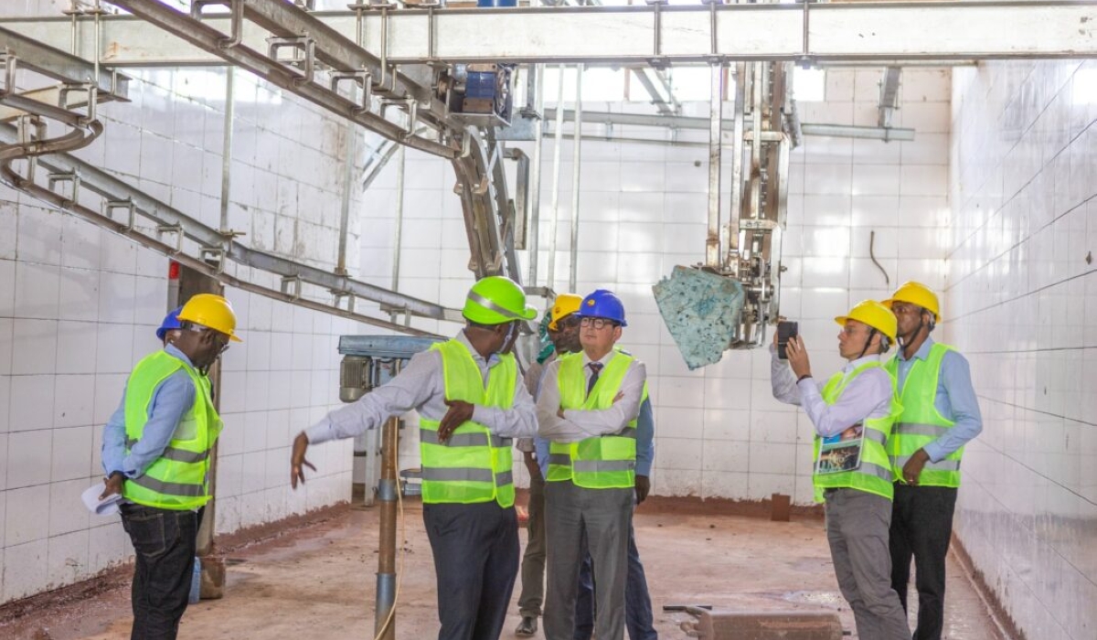 Visitors tour the new plant that will process 200 cows, 300 sheep and goats, as well as 200 pigs per day  in Rusizi District.