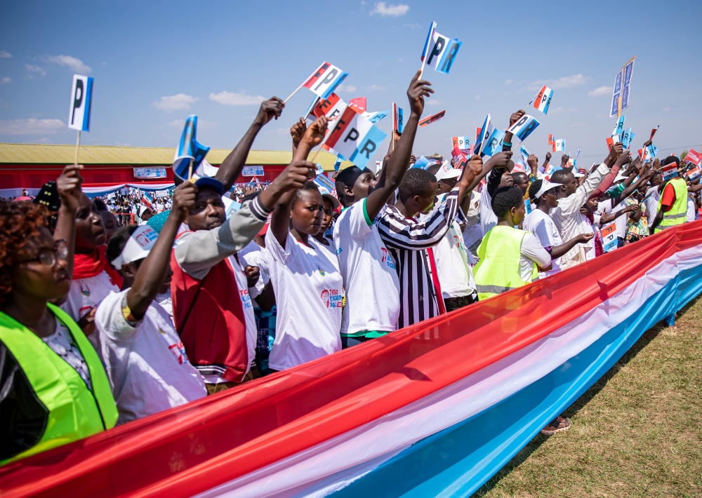 RPF members during a campaign rally in Kamonyi District’s Ngoma Stadium, where more than 35,000 RPF supporters converged to listen to the candidates. PHOTOS BY DAN GATSINZI