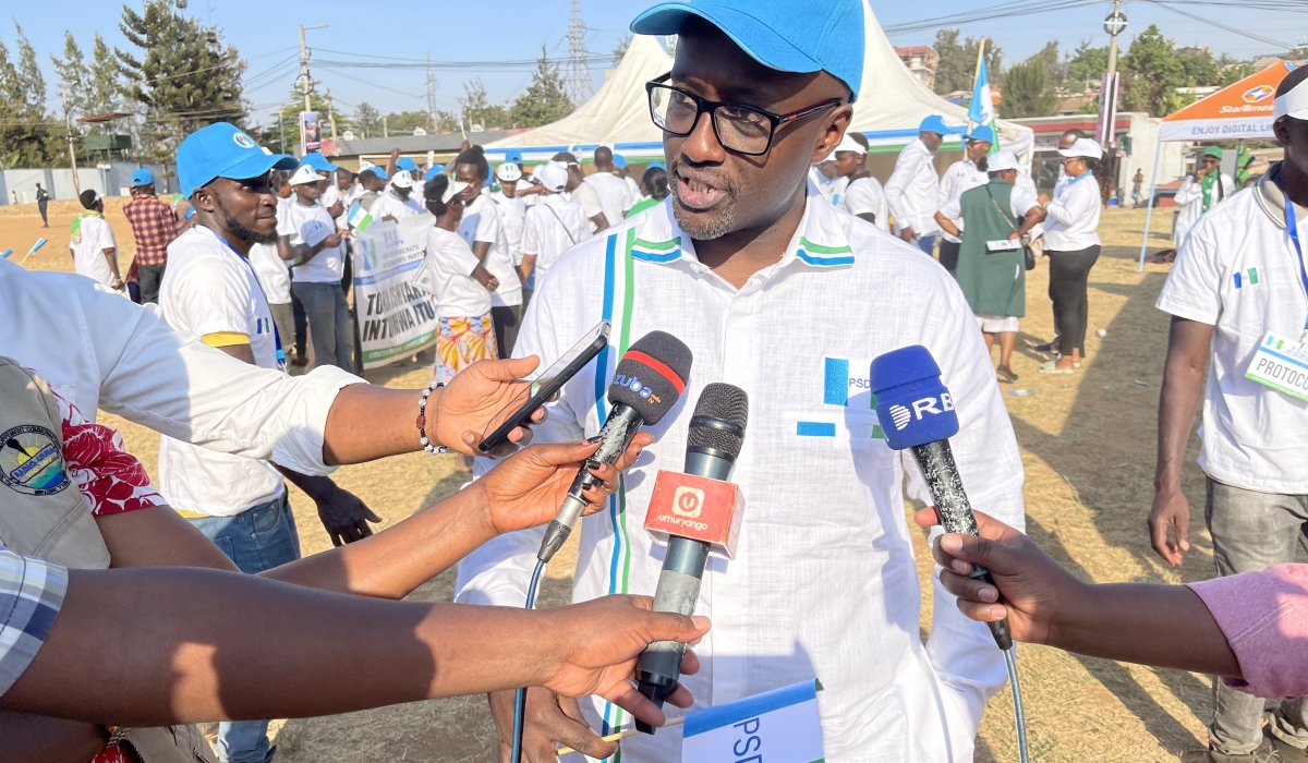 Olivier Nduhungirehe, a PSD member, who is also Rwanda’ Minister of Foreign Affairs and International Cooperation speaks to journalists at the campaign on Sunday, June 30. Emmanuel Ntirenganya