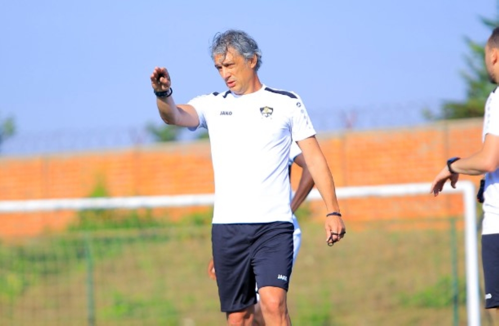 APR FC head coach Darko Novic gives instructions to the players during a training session ahead of Monday&#039;s game against Police FC during the official opening of Amahoro stadium.