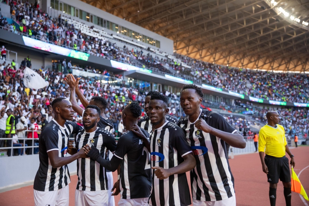 APR FC players celebrate the goal during a friendly match between APR and Police FC