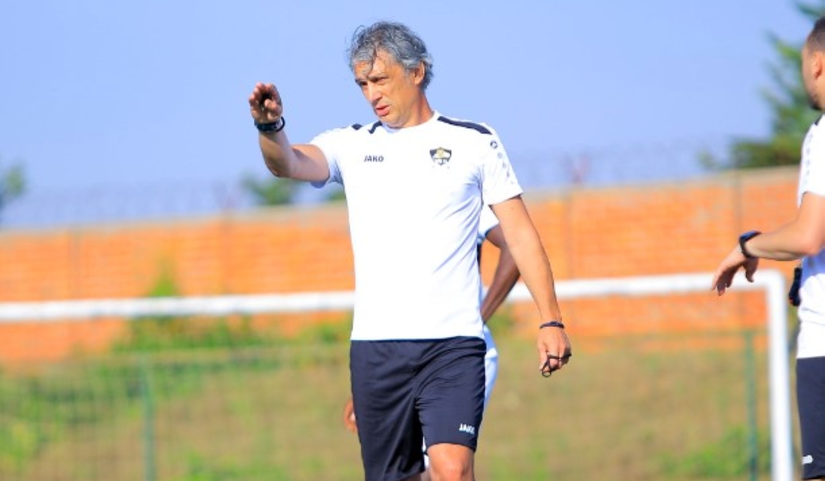 APR FC head coach Darko Novic gives instructions to the players during a training session ahead of Monday&#039;s game against Police FC during the official opening of Amahoro stadium.