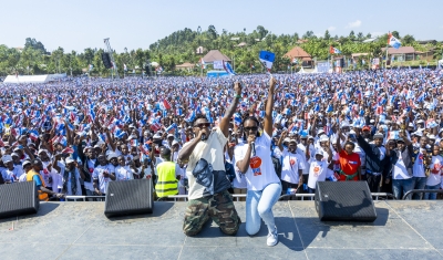 Artiste Bruce Melodie dons Sonia Mugabo’s “Ode to PK” inspired T-shirt while performing with Bwiza in Rubengera on Sunday, June 30. Photo by Olivier Mugwiza