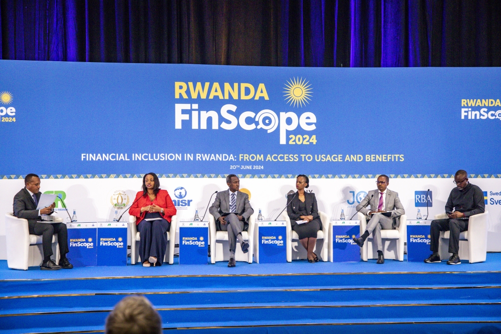 Panelists discuss during the presentation of the recent Finscope survey  that showed that the country was on track to increase its savings with adult savings currently standing at 85 per cent (6.9 million adults). Emmy Dushimimana