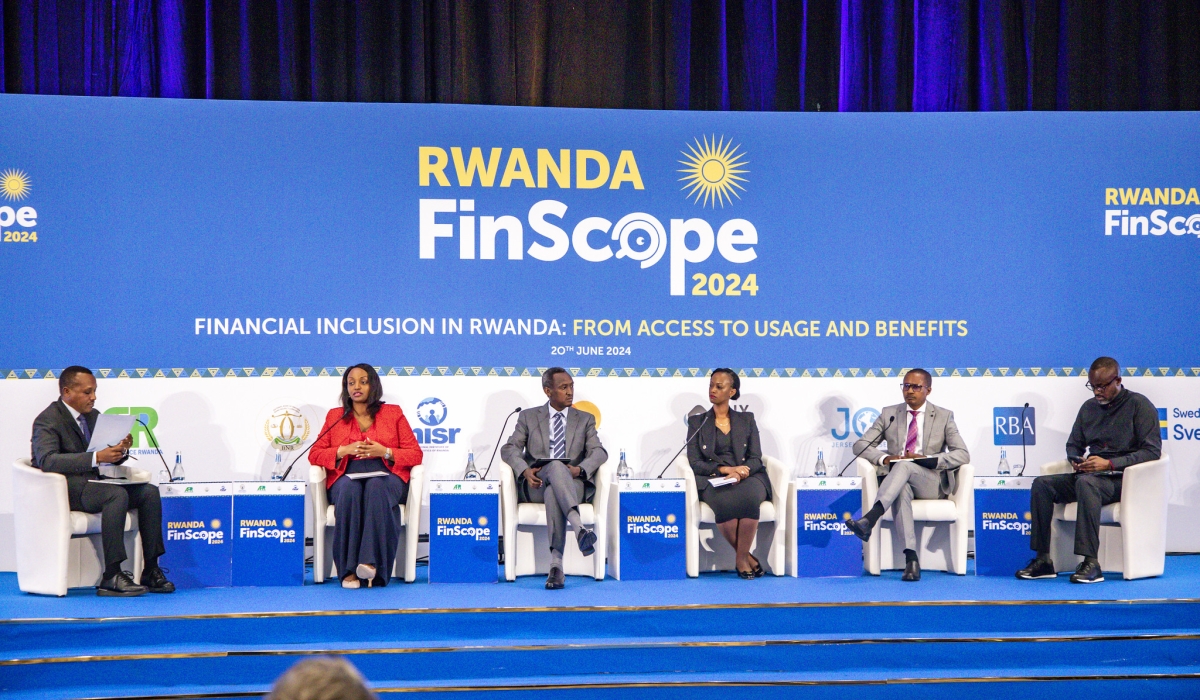 Panelists discuss during the presentation of the recent Finscope survey  that showed that the country was on track to increase its savings with adult savings currently standing at 85 per cent (6.9 million adults). Emmy Dushimimana