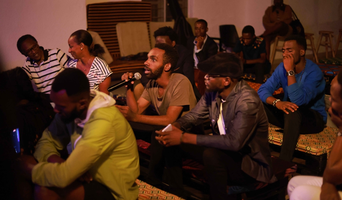 Participants at an evening of poetry reflecting liberation to life through powerful spoken word performances