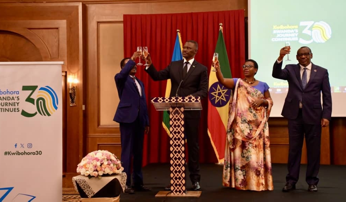 (L-R) Fissaha Shawel, the representative of  the Ethiopian government,  Ambassador of Rwanda Charles Karamba ,Monique Nsanzabaganwa, the Deputy Chairperson for the African Union Commission, Claver Gatete, Executive Secretary of the UN Economic Commission for Africa (UNECA) toast to celebrate the 30th Liberation anniversary. Courtesy