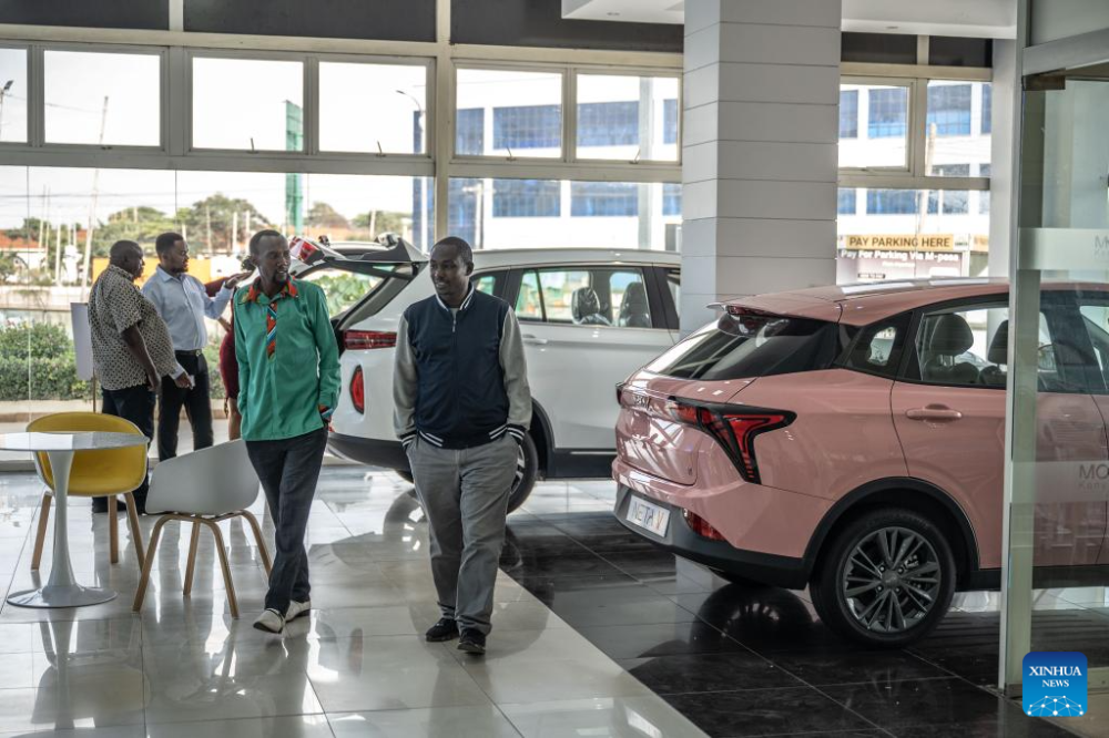 Customers visit a store of Chinese automotive brand Neta in Nairobi, Kenya, July 5, 2024. Chinese automotive brand Neta announced its entry into the Kenyan market on June 26, 2024. (Xinhua/Wang Guansen)