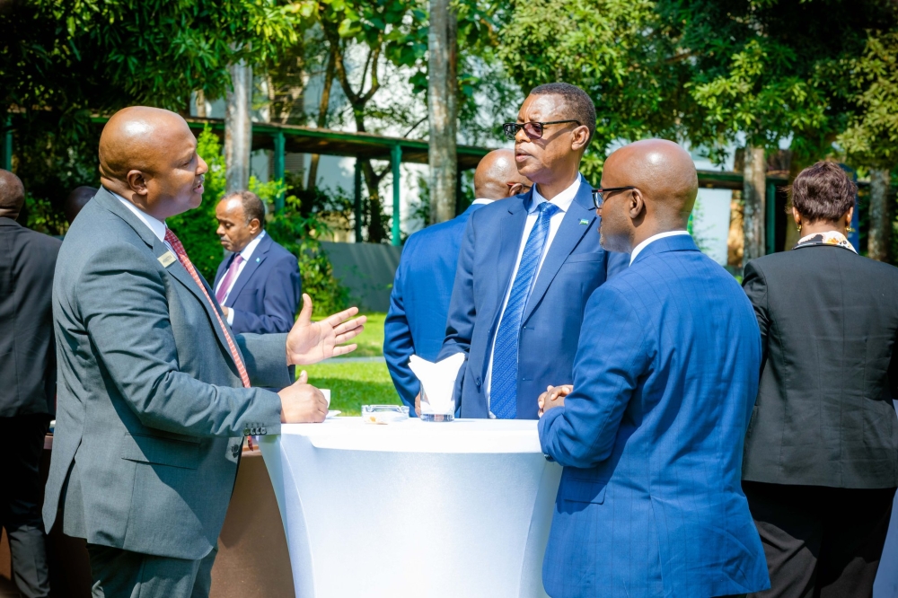 Burundi&#039;s Minister of Foreign Affairs and Development Cooperation Albert Shingiro interacts with Rwanda&#039;s Minister of Foreign Affairs and International Cooperation, Olivier Nduhungirehe, and the Minister of State in charge of Regional Cooperation, James Kabarebe, at the three-day East African Community (EAC) Ministerial Retreat  in Zanzibar, on July 6. Courtesy