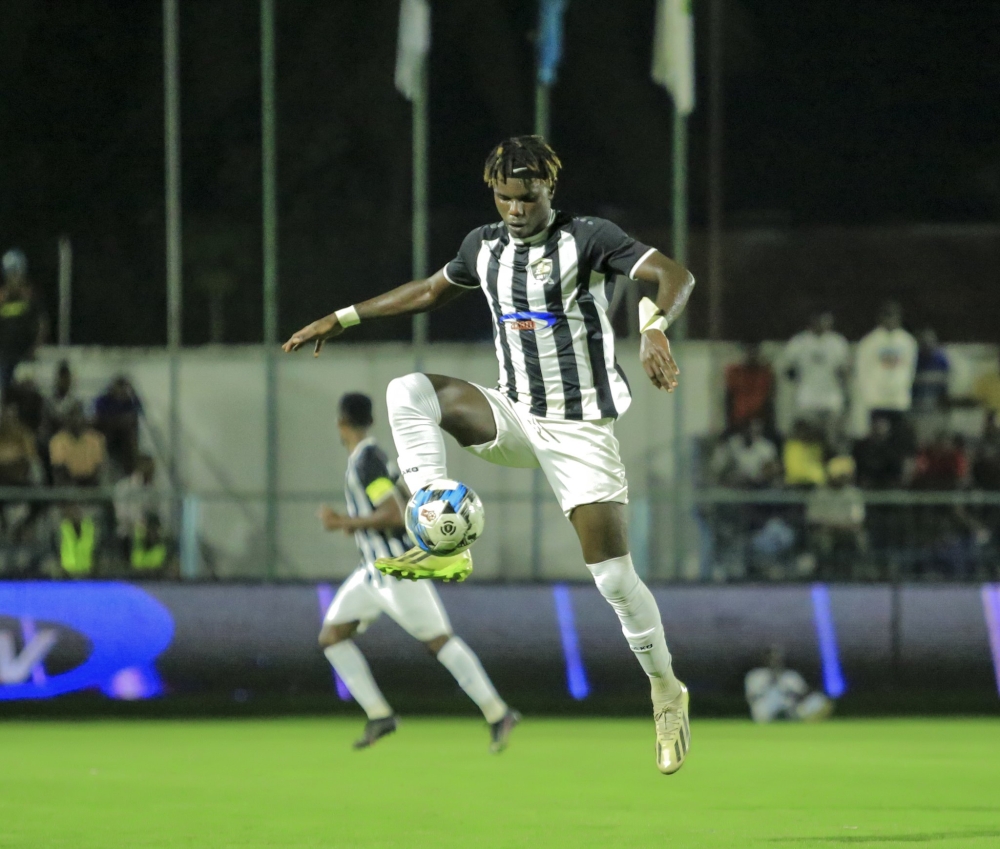 Army side Clement Niyigena with the ball