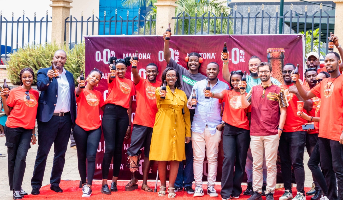 Officials and participants celebrate Skol Brewery Ltd’s newly launched Maltona, a new non-alcoholic malted beverage hitting
shelves everywhere now, in Kigali on July 8. Photos: Craish Bahizi.