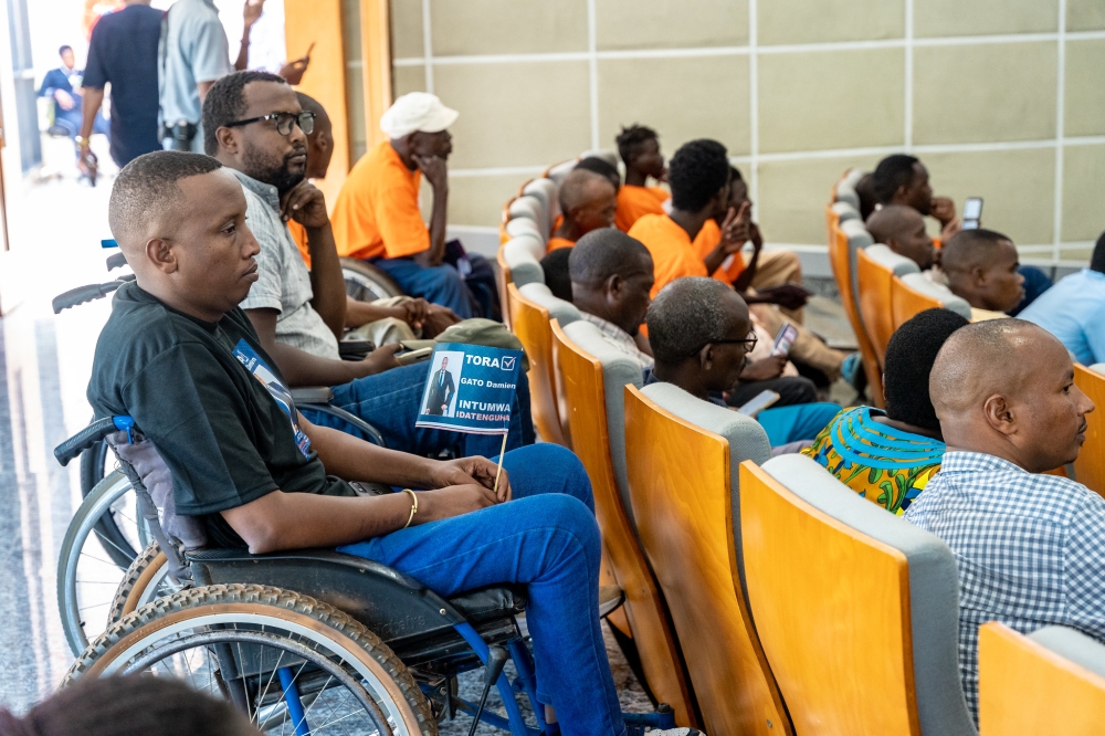 People with disabilities follow candidates&#039; manifesto during the launch of their campaign in Kigali, on July 2. Craish Bahizi