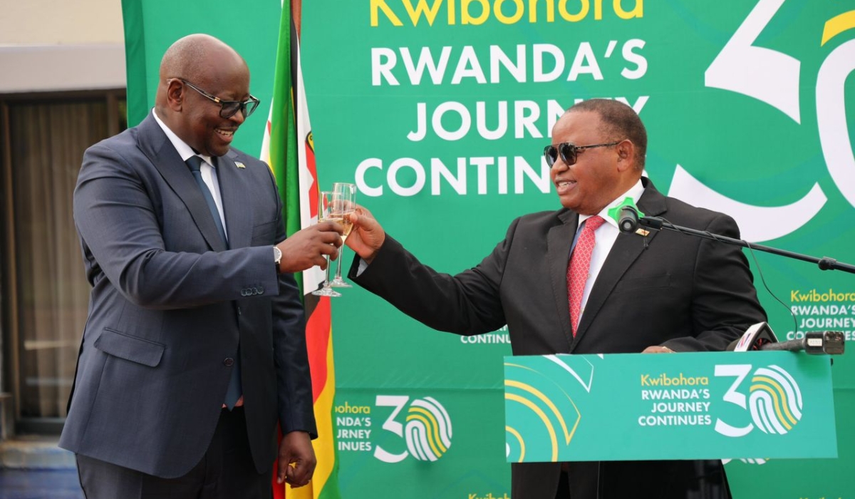 Rwanda&#039;s Envoy James Musoni and Zimbabwe’s Minister of Foreign Affairs and International Trade Frederick Shava  toast during Kwibohora 30 celebrations in  Zimbabwe in Harare on Thursday, July 11. Courtesy