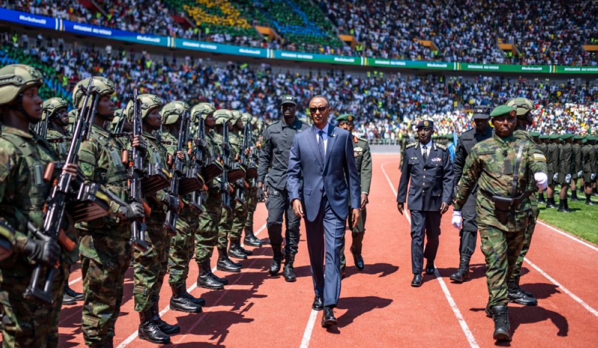 President Kagame, the Commander-In-Chief of the Rwanda Defence Force, inspects the military parade at Amahoro stadium during the 30 liberation ceremony at Amahoro stadium on July 4. Photo by Dan Gatsinzi