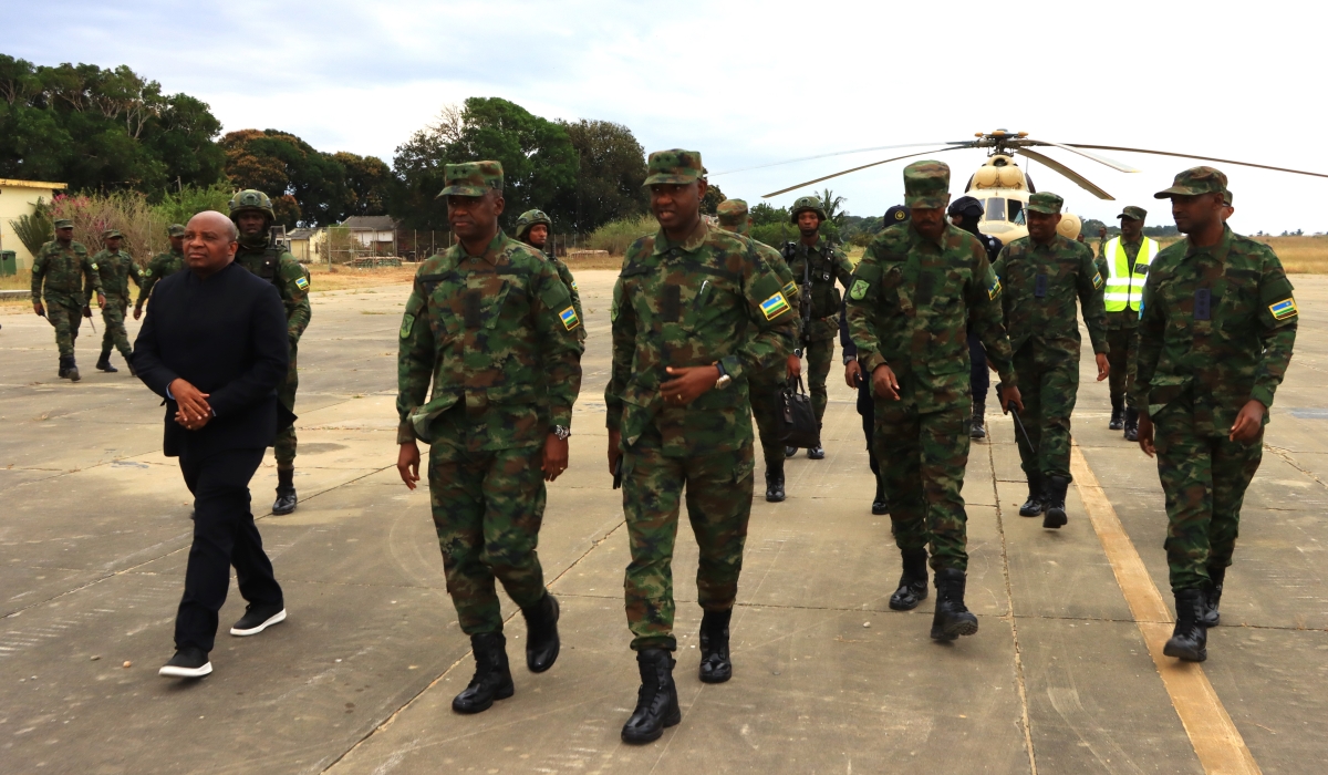 Left to right: Maj Gen Alberto Diago Nampele, the Army Commander of Mozambican forces, Rwanda Defence Force Army Chief of Staff Maj Gen Vincent Nyakarundi, the Joint Task Force Commander, Maj Gen Alex Kagame, and other senior officers, arrive at Mocimboa da Praia airport on July 11. Courtesy