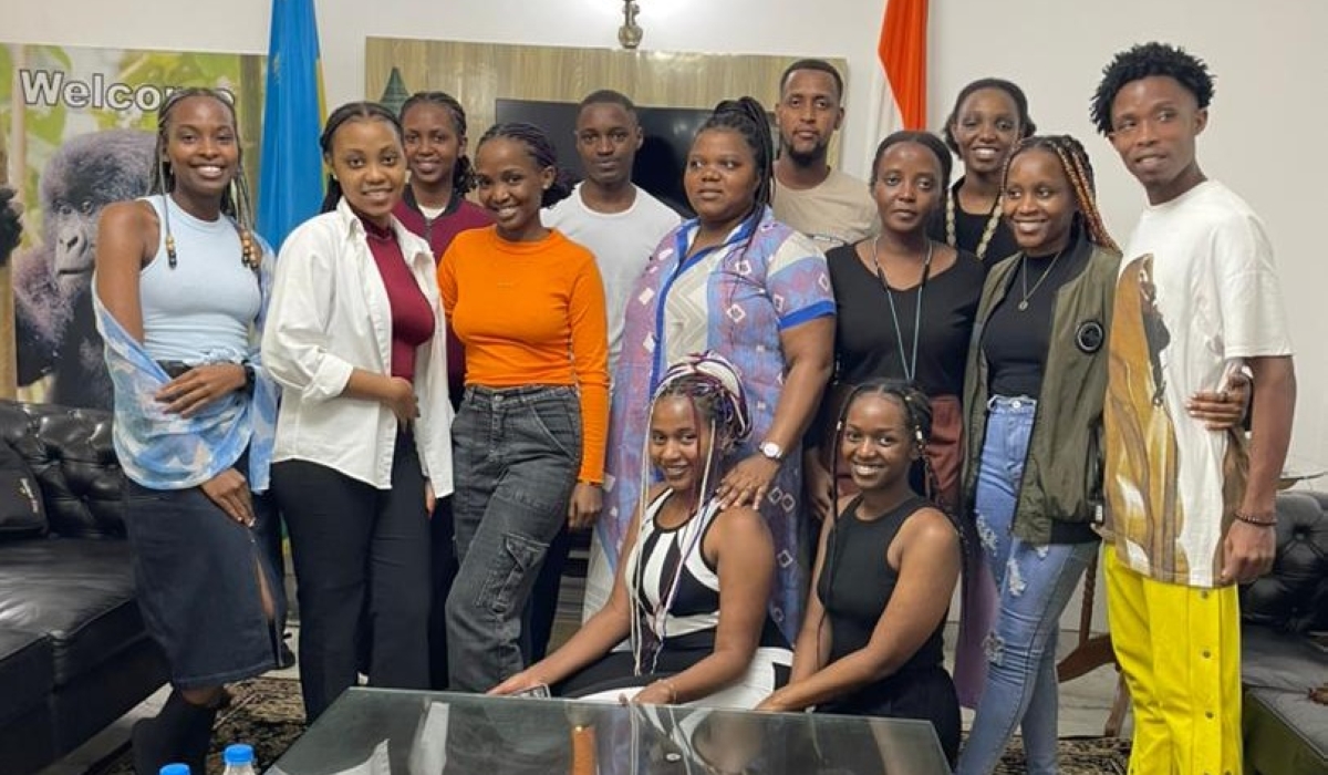 Nadege Ngoga (in black dress, seated in front) and other Rwandan university students from Koneru Lakshimaiah University, in Andhra Pradesh, a state in the southern coastal region of India, pose for a picture at the Rwandan High Commission in New Delhi, on Saturday, July 13. Majority of the Rwandan students in Andhra Pradesh are first time voters. Courtesy