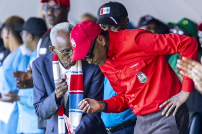 With a clenched fist and a scarf in RPF colours, this senior citizen looked the part as he whispered something in incumbent President Kagame&#039;s ear during the latter&#039;s campaign rally in Kirehe on July 2.