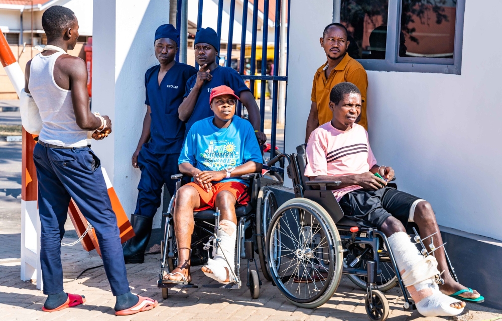 Voters who are currently admitted to CHUK hospital arrive at the polling site, set opposite the hospital to facilitate patients and caregivers to cast their votes. Photos by Craish Bahizi