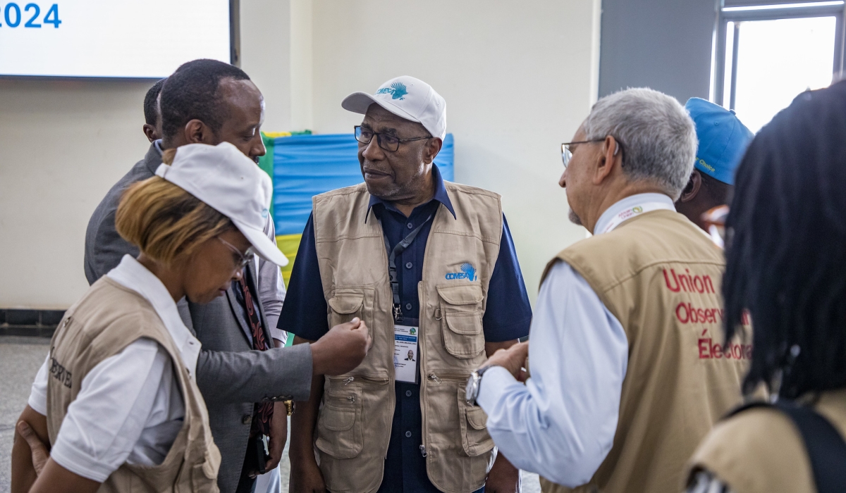 Jorge Carlos Fonseca (R), the former President of Cabo Verde who led the joint African Union-Common Market for Eastern and Southern Africa election observers&#039; delegation, his deputy head of mission, Ruhakana Rugunda (C), Uganda&#039;s former Prime Minister, and other observers, in Kigali on Tuesday, July 16. International election observers commended Rwanda for a peaceful electoral environment during the July 15-16 general elections. Photo by Emmanuel Dushimimana