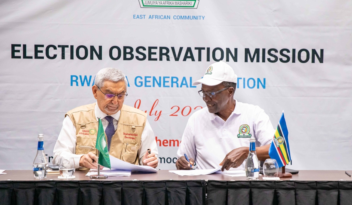 Jorge Carlos Fonseca (L), the former President of Cabo Verde who led the joint African Union-Common Market for Eastern and Southern Africa election observers&#039; delegation interacts with David Maraga, the former Chief Justice of Kenya who headed the EAC Election Observation Mission  during a press conference on Wednesday, July 17. Dan Gatsinzi