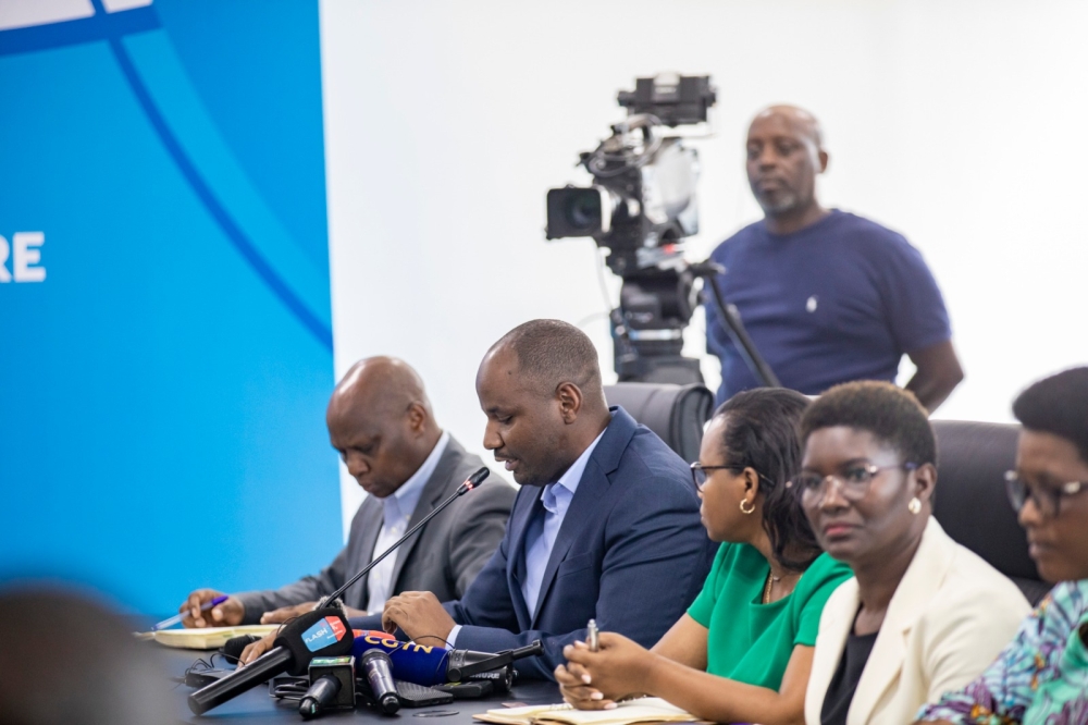 NEC staff while announcing provisional  results of the elections on Thursday on July 18. Photo by Emmanuel Dushimimana